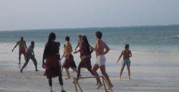 Playing Football at the beach zanzibar accommodations deals