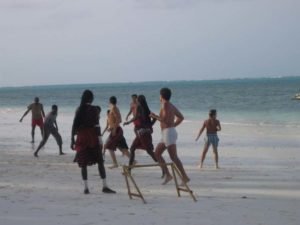 Playing Football at the beach zanzibar accommodations deals